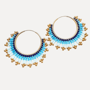 Blue and gold beaded hoop earrings.